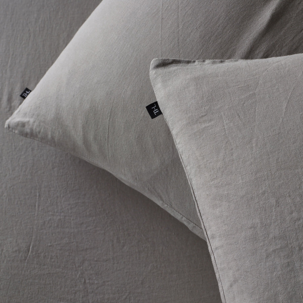 The Honest Label Pure Linen European Pillowcase in Light Grey with grey tones pillowcase close up detail THL product image 3