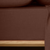 The Honest Label Pure Linen Fitted Sheet in Cacao with brown tones fitted sheet close up detail