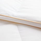 The Honest Label Chamonix Luxury French 90/10 Goose Down Quilt home bedding styled bedroom view THL product image 4