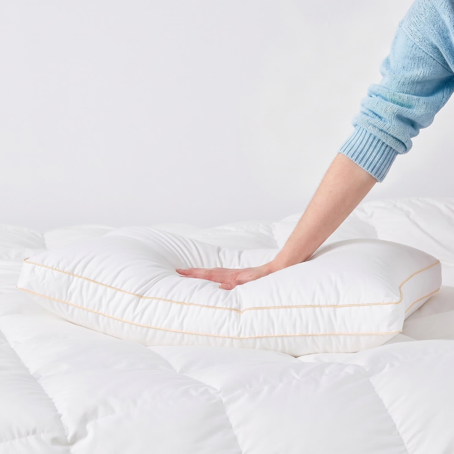 The Honest Label Chamonix Luxury French 90/10 Goose Down Pillow pillowcase lifestyle view THL product image 2