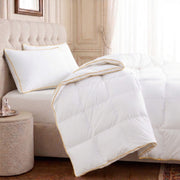 The Honest Label Chamonix Luxury French 90/10 Goose Down Quilt home bedding styled bedroom view THL product image 1