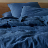 The Honest Label Pure Linen European Pillowcase in Ocean Blue with blue tones pillowcase close up detail THL product image 1