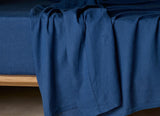 The Honest Label Pure Linen Fitted Sheet in Ocean Blue with blue tones fitted sheet close up detail THL product image 3