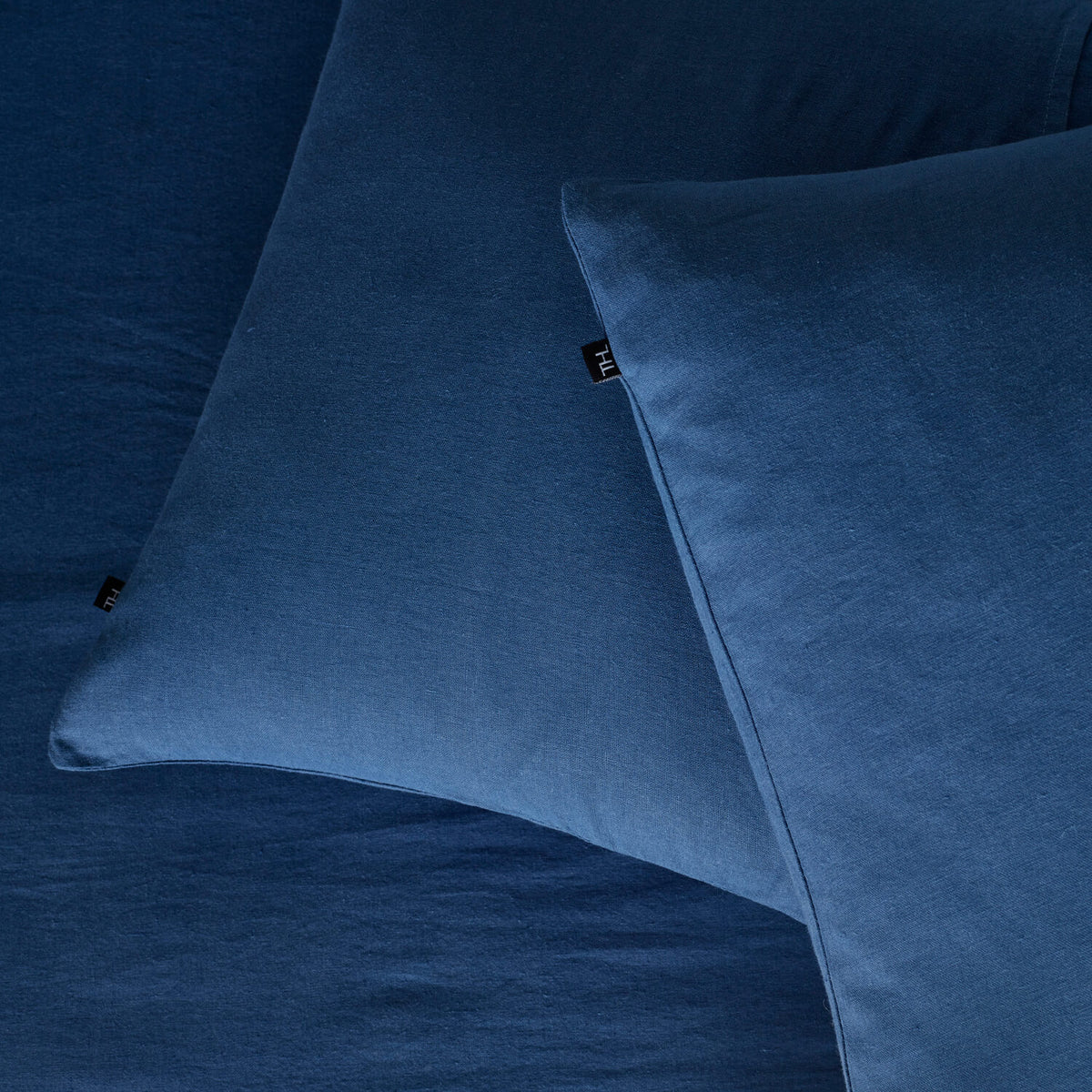 The Honest Label Pure Linen European Pillowcase in Ocean Blue with blue tones pillowcase close up detail THL product image 3