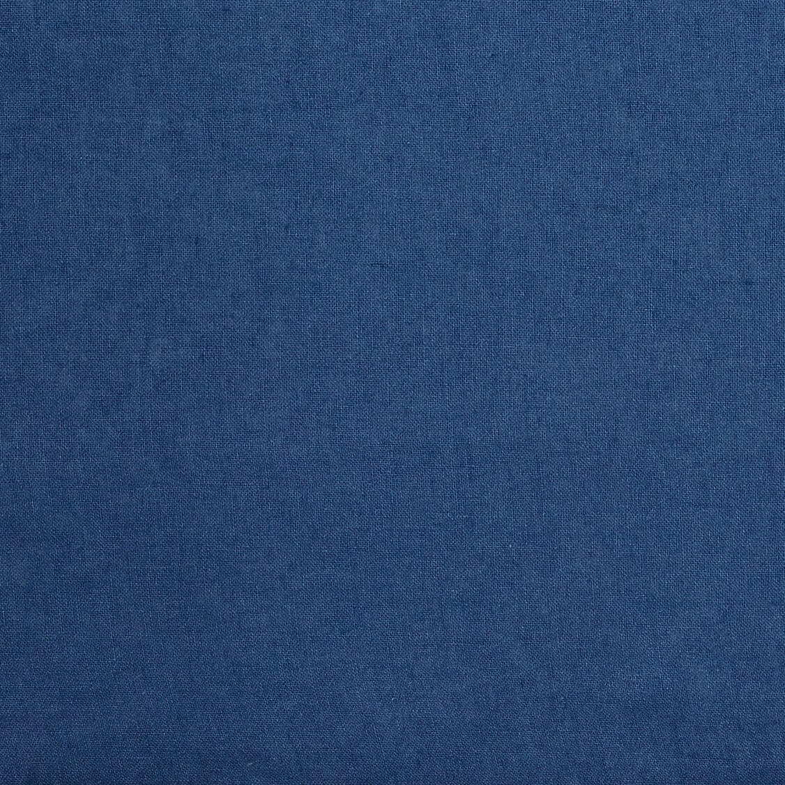 The Honest Label French Flax Linen fabric swatch in Ocean Blue with blue tones fabric sample close up detail