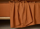 The Honest Label Pure Linen Flat Sheet in Red Earth with red tones flat sheet product view THL product image 1