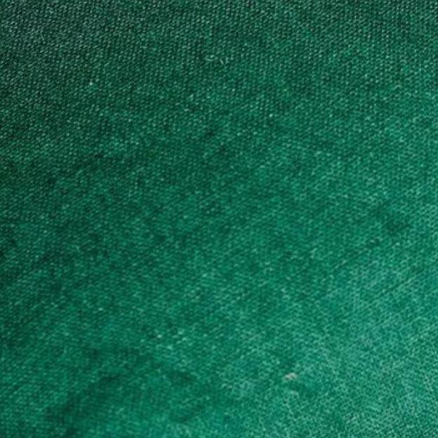 The Honest Label Pure Linen Fitted Sheet fabric swatch in Forest Green with green tones fitted sheet fabric swatch