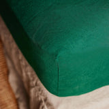 The Honest Label Pure Linen Fitted Sheet in Forest Green with green tones fitted sheet product view THL product image 1