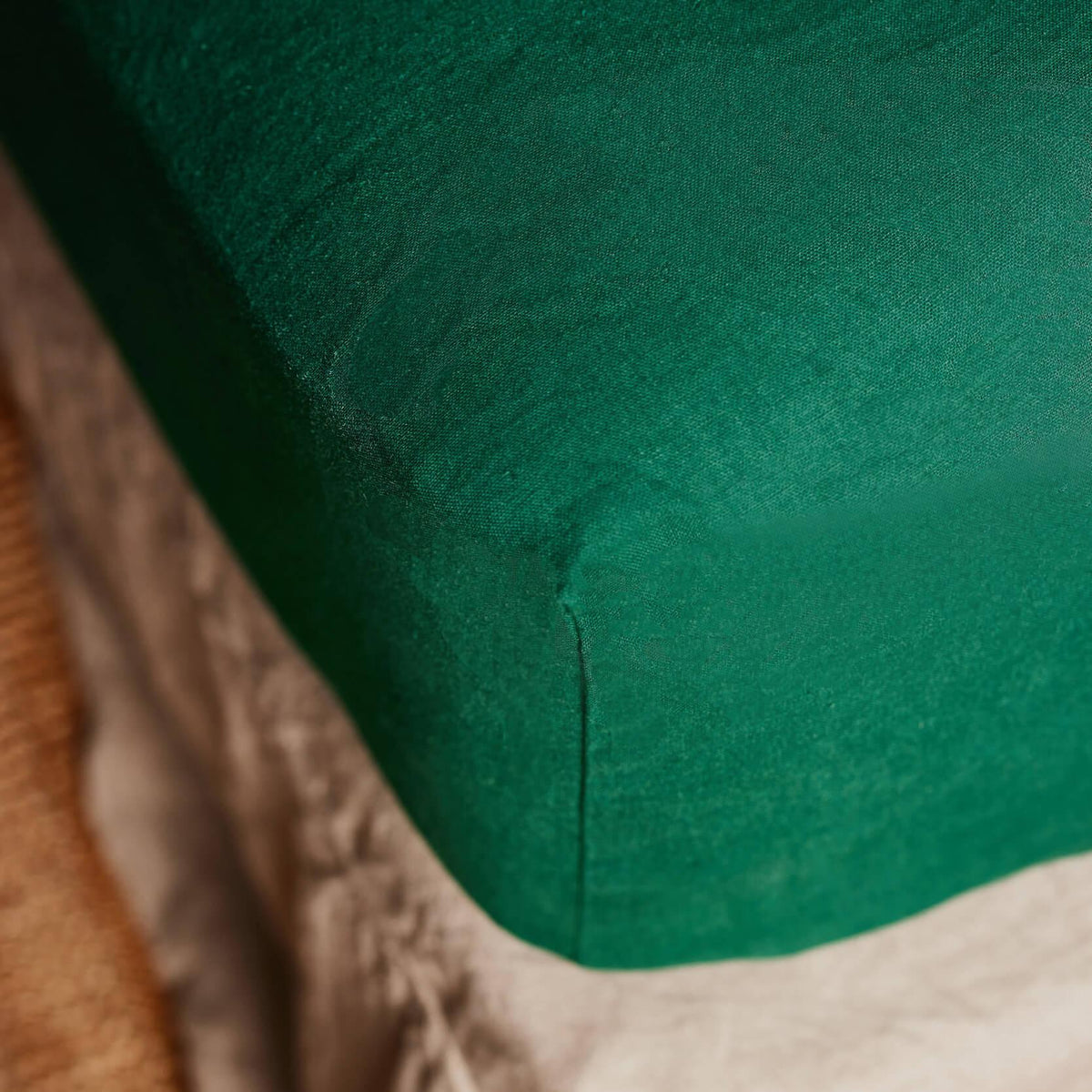 The Honest Label Pure Linen Fitted Sheet in Forest Green with green tones fitted sheet product view THL product image 1