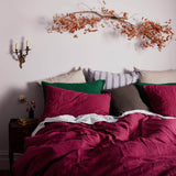 The Honest Label Pure Linen Quilt Cover Set Incl Pillowcases in Magenta with pink tones pillowcase styled bedroom view