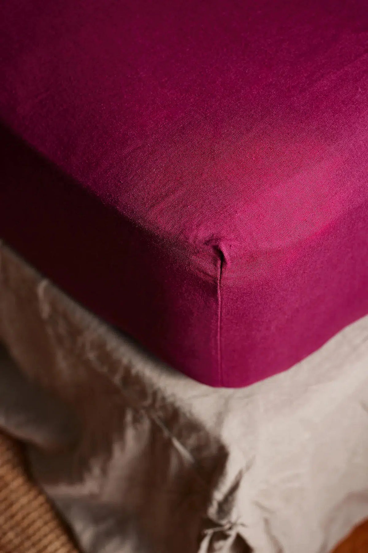 The Honest Label Bed Builder fitted sheet in Magenta with pink tones fitted sheet product view