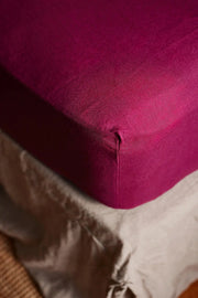 The Honest Label Bed Builder fitted sheet in Magenta with pink tones fitted sheet product view