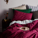 The Honest Label Pure Linen European Pillowcase in Magenta with pink tones pillowcase styled bedroom view THL product image 1