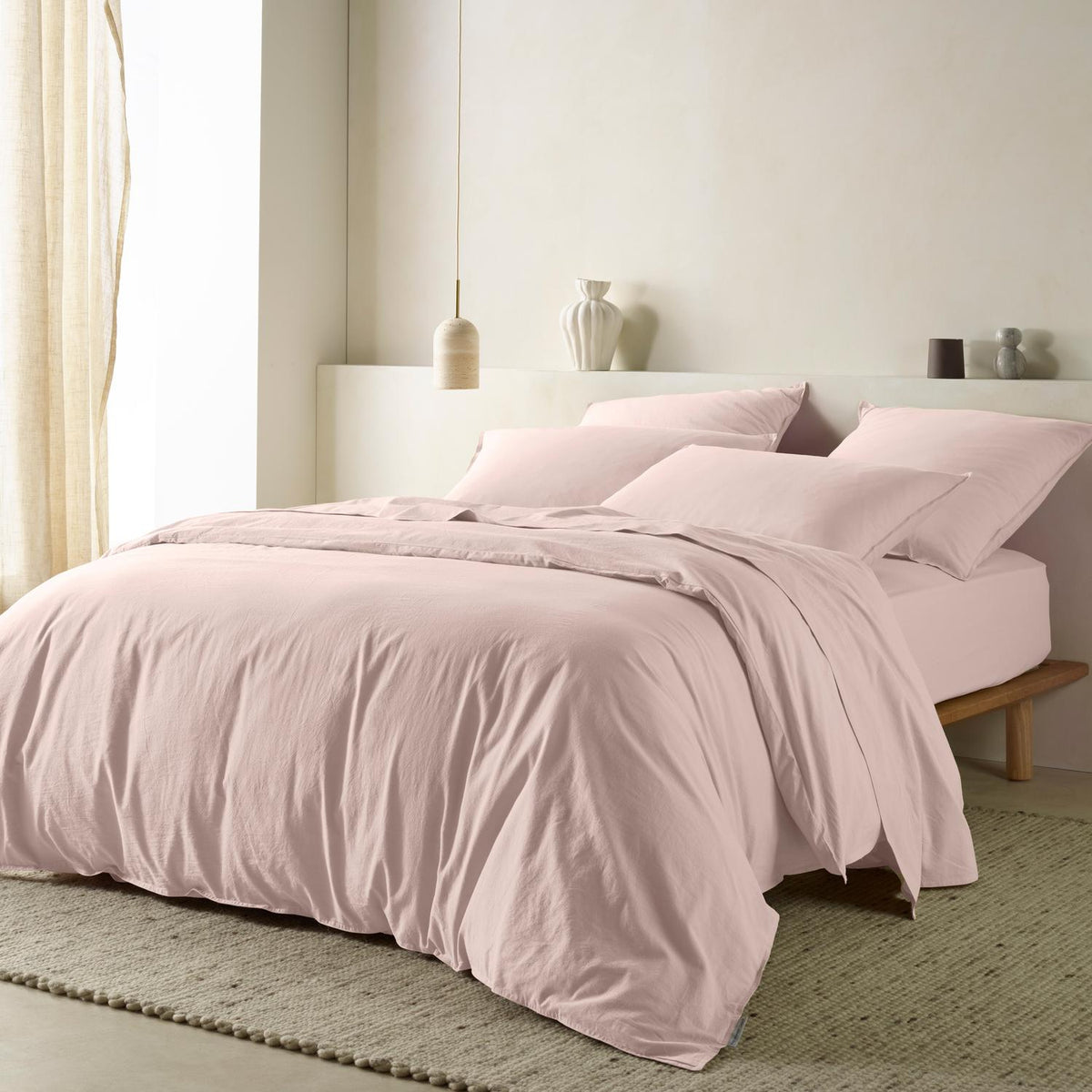 The Honest Label washed cotton bedding in Blush, angled view