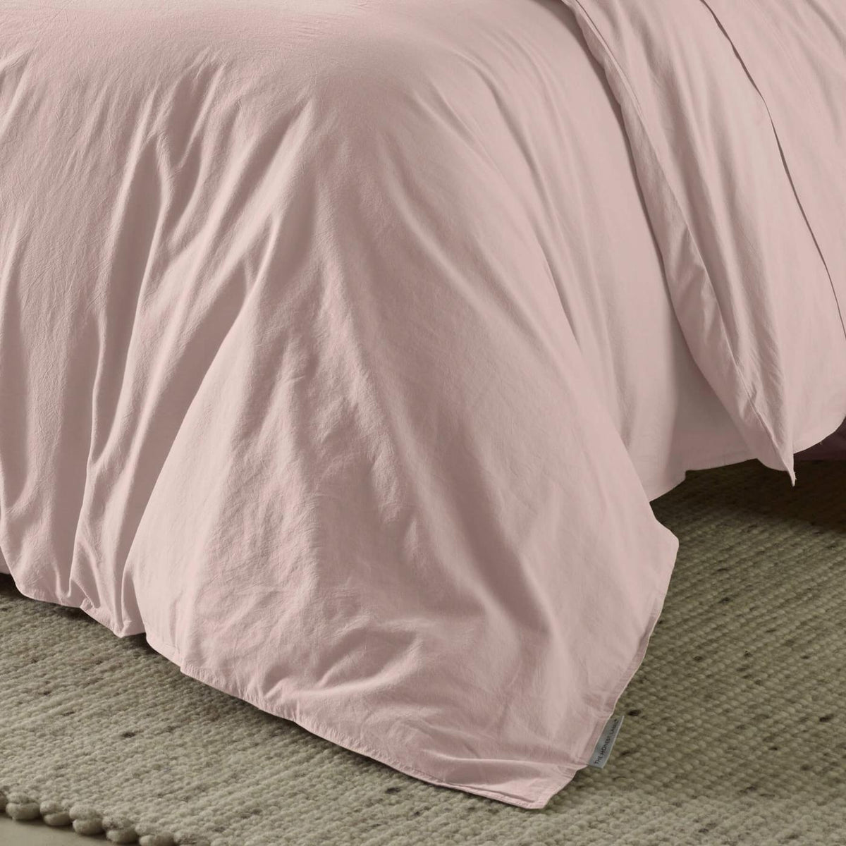 The Honest Label Washed Cotton Quilt Cover in Blush with pink tones quilt cover close up detail THL product image 2