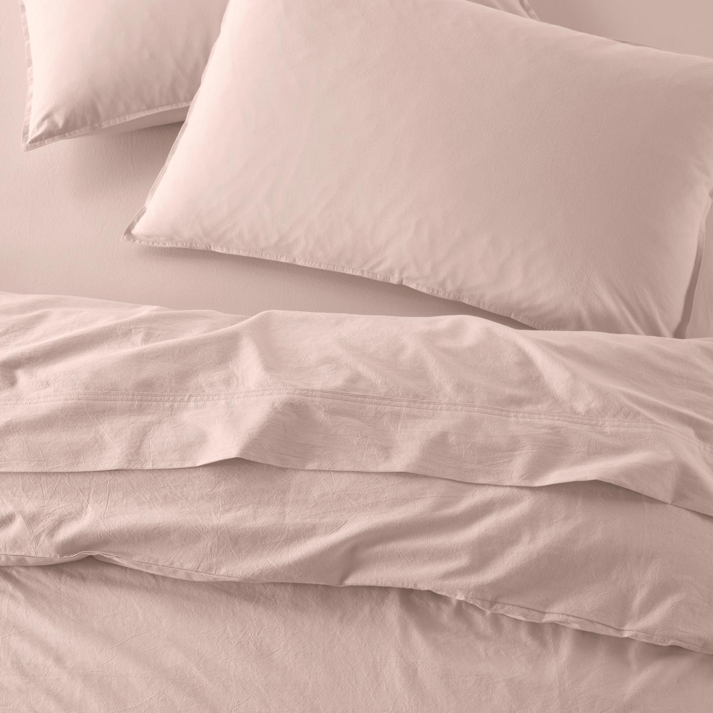 The Honest Label washed cotton bedding in Blush, overhead view
