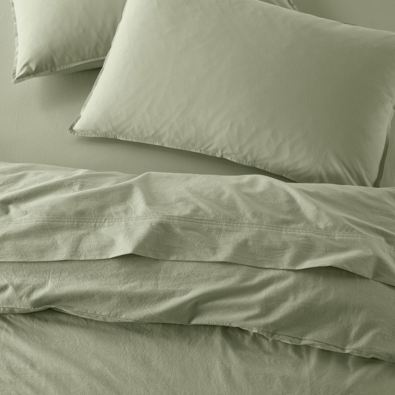 The Honest Label washed cotton bedding in Sage, overhead view