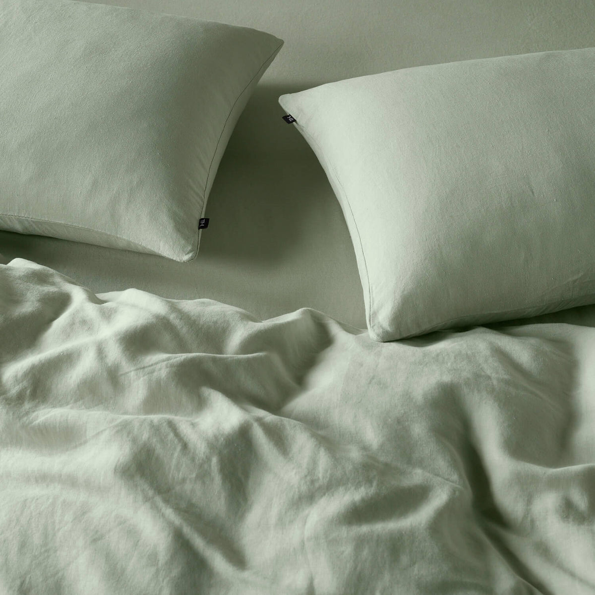 The Honest Label Pure Linen Standard Pillowcase (2 Pack) in Sage with green tones pillowcase product view THL product image 4