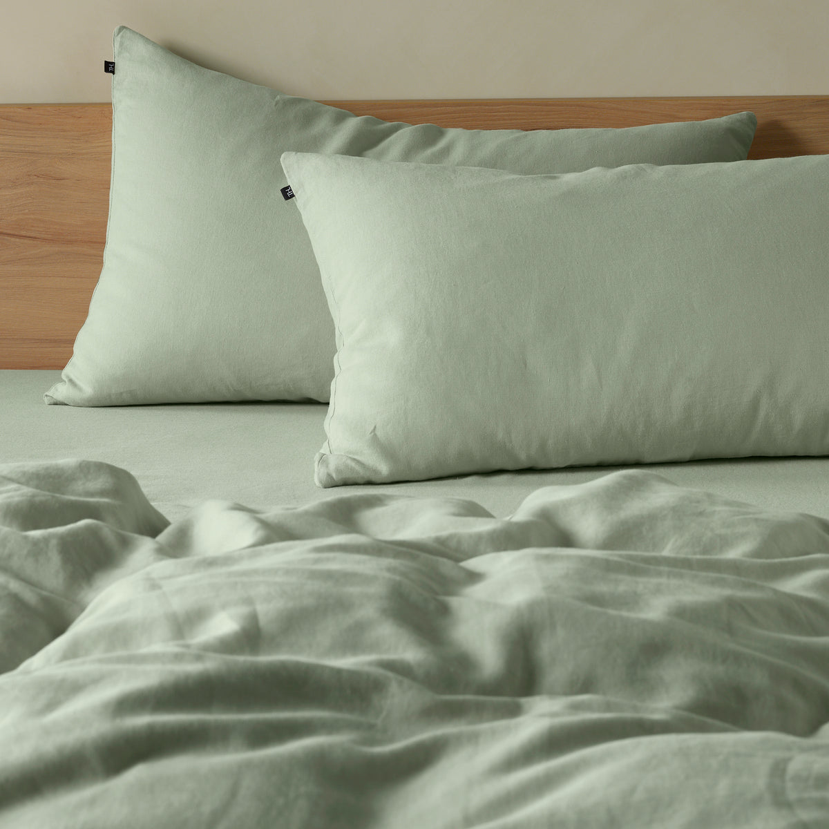 The Honest Label Pure Linen Standard Pillowcase (2 Pack) in Sage with green tones pillowcase product view THL product image 1