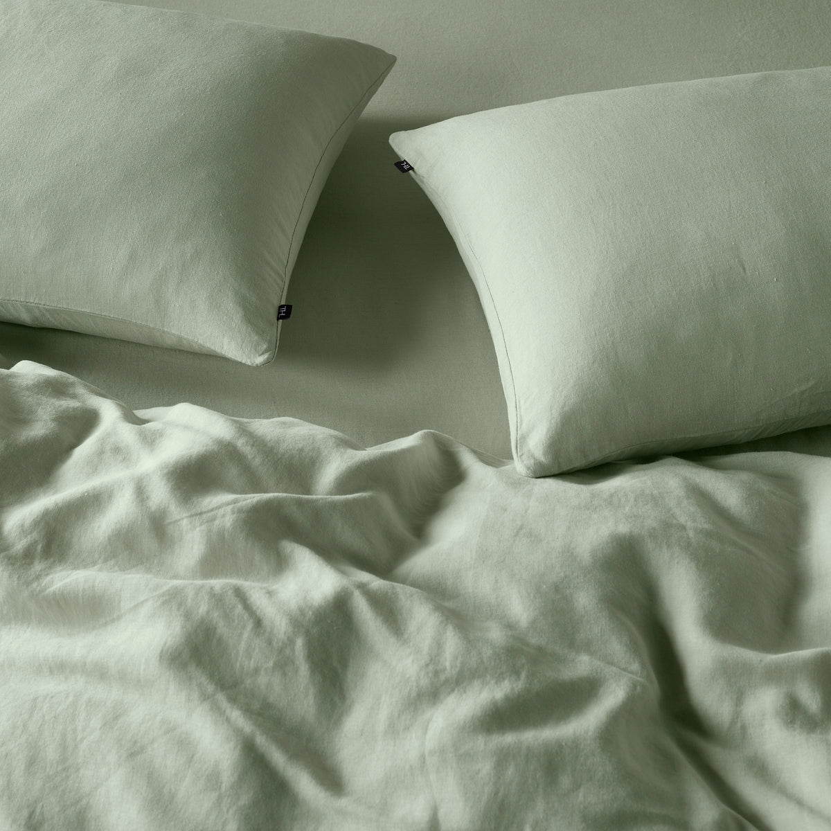 The Honest Label Pure Linen Quilt Cover Set Incl Pillowcases in Sage with green tones pillowcase product view THL product image 3