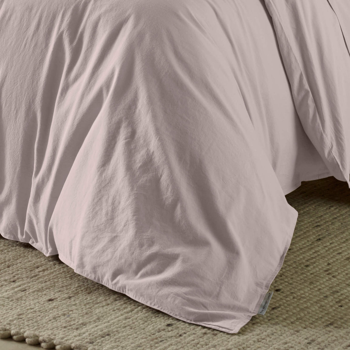 The Honest Label Washed Cotton Quilt Cover in Blush with pink tones quilt cover close up detail THL product image 2