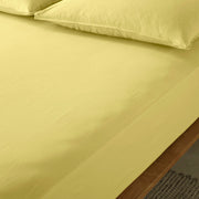 The Honest Label Washed Cotton Standard Pillowcase (2 Pack) in Butter with yellow tones pillowcase product view THL product image 3