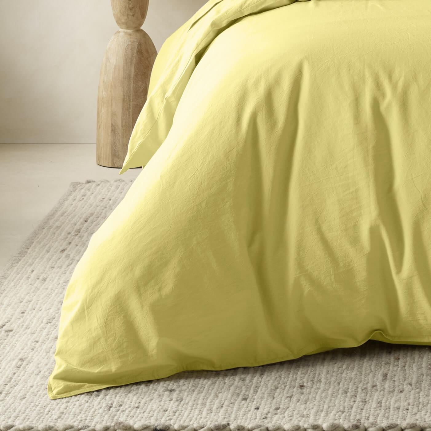 The Honest Label Washed Cotton Quilt Cover in Butter with yellow tones quilt cover close up detail THL product image 1