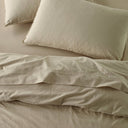 The Honest Label Washed Cotton Standard Pillowcase (2 Pack) in Flax with beige tones pillowcase top view