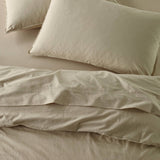 The Honest Label Washed Cotton Standard Pillowcase (2 Pack) in Flax with beige tones pillowcase top view