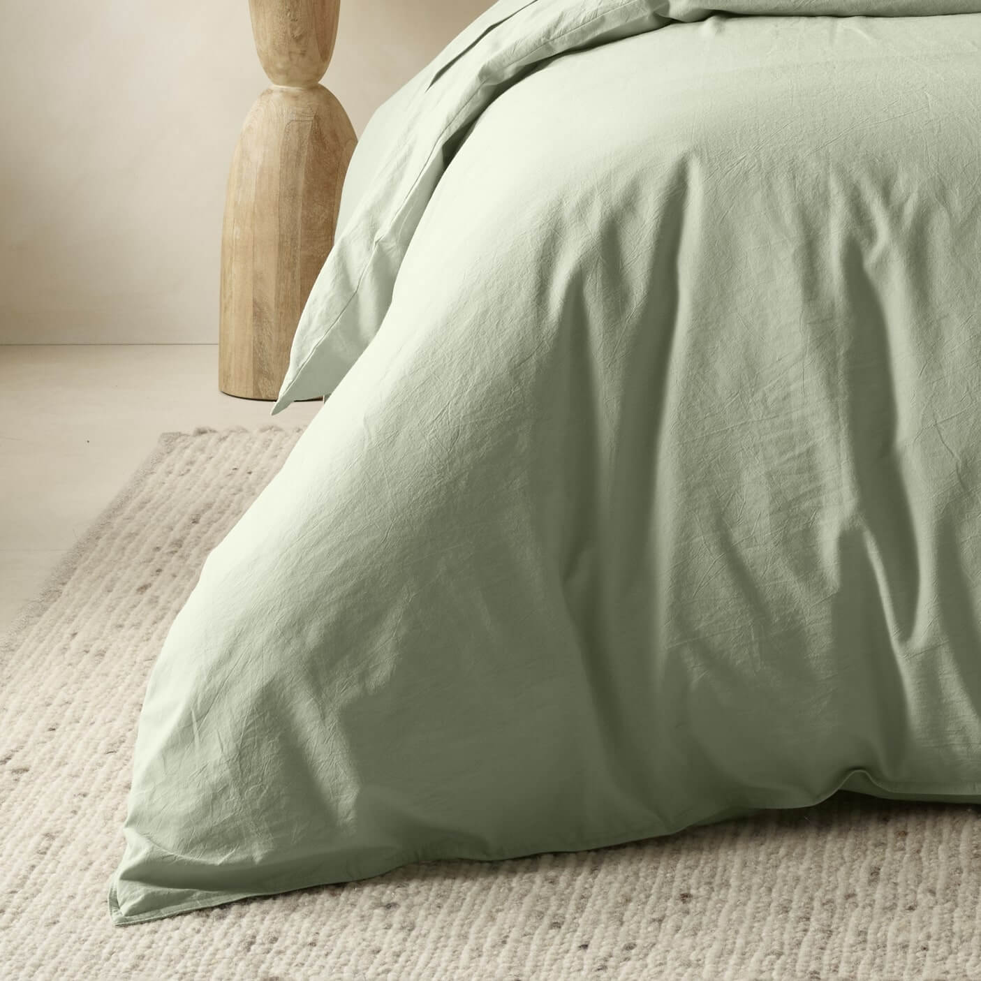 The Honest Label Washed Cotton Quilt Cover in Sage with green tones quilt cover close up detail THL product image 1