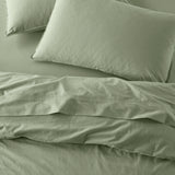 The Honest Label Washed Cotton Standard Pillowcase (2 Pack) in Sage with green tones pillowcase top view