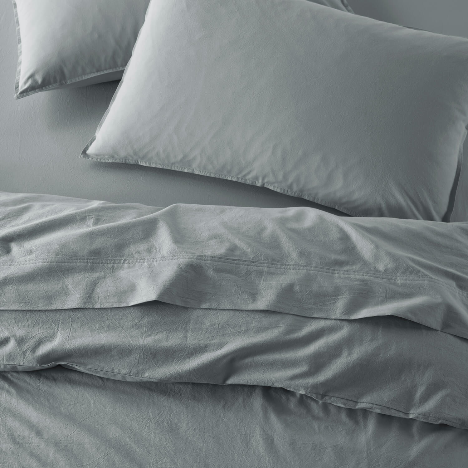 The Honest Label Washed Cotton Standard Pillowcase (2 Pack) in Slate with grey tones pillowcase top view
