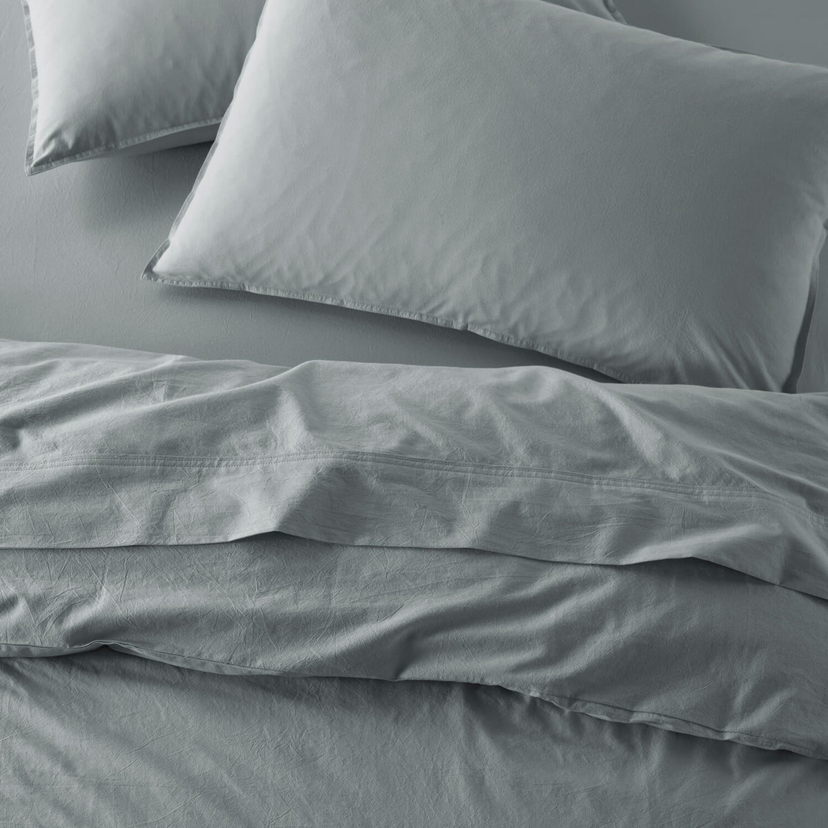 The Honest Label Washed Cotton Standard Pillowcase (2 Pack) in Slate with grey tones pillowcase top view
