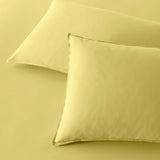 The Honest Label Washed Cotton Standard Pillowcase (2 Pack) in Butter with yellow tones pillowcase product view THL product image 1