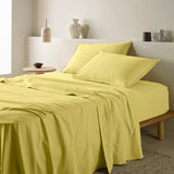 The Honest Label Washed Cotton Flat Sheet in Butter with yellow tones flat sheet product view THL product image 1