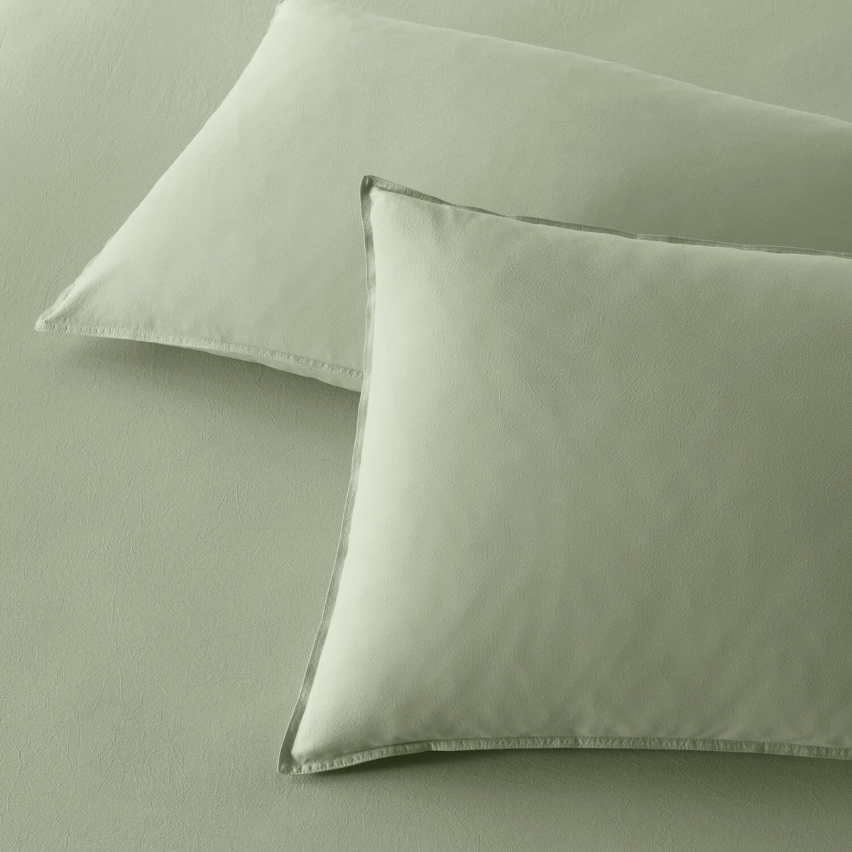 The Honest Label Washed Cotton Standard Pillowcase (2 Pack) in Sage with green tones pillowcase product view THL product image 1