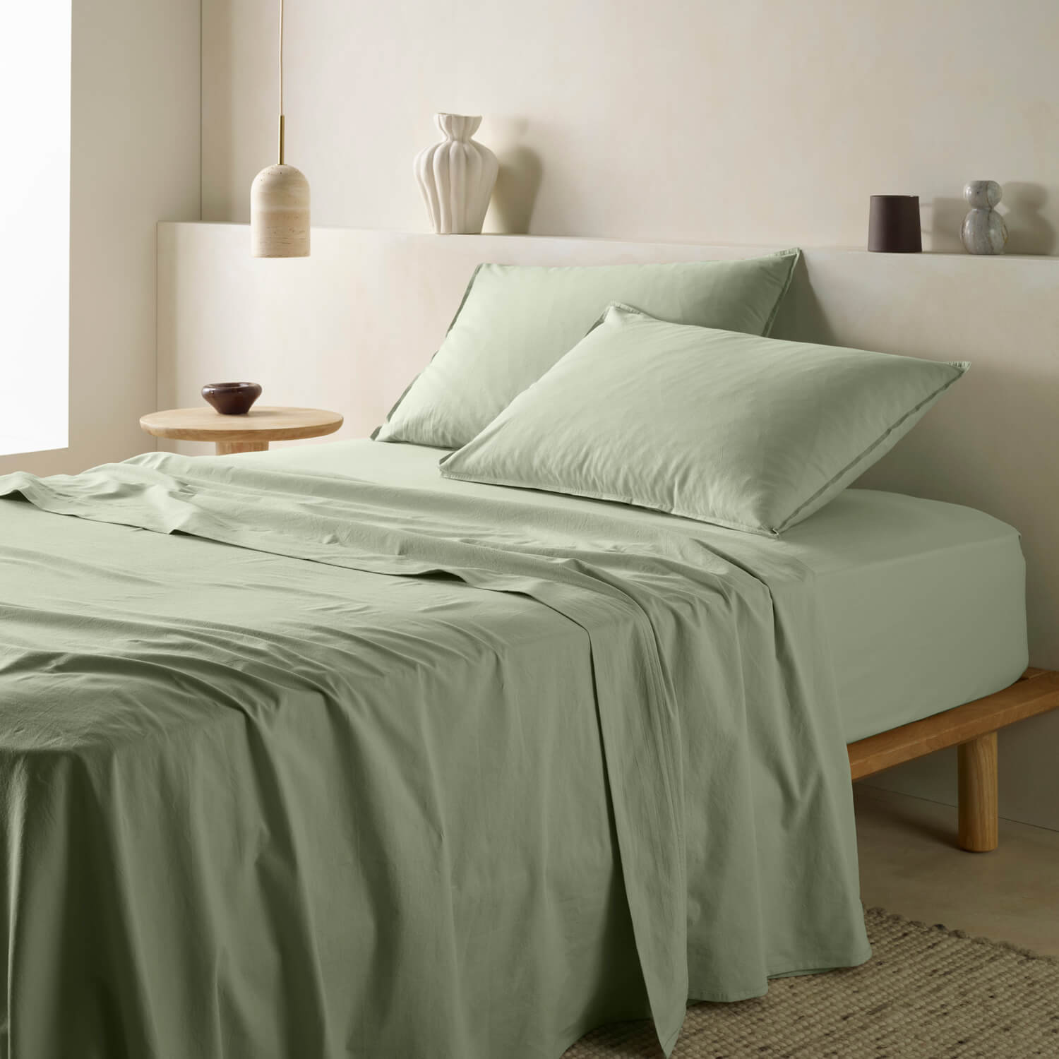 The Honest Label Washed Cotton Flat Sheet in Sage with green tones flat sheet product view THL product image 1
