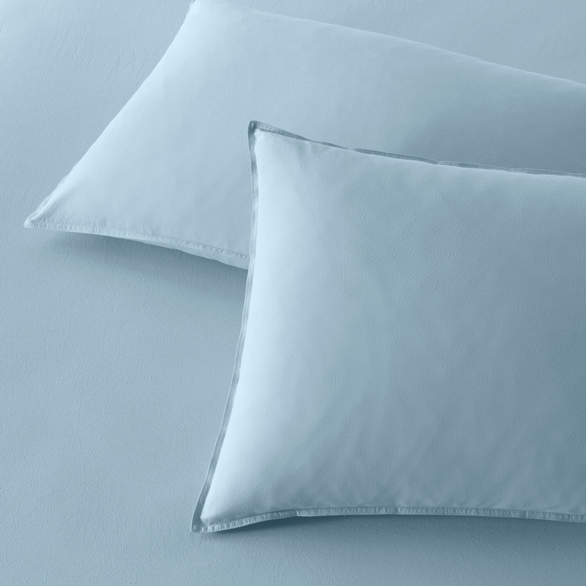 The Honest Label Washed Cotton Standard Pillowcase (2 Pack) in Skye with blue tones pillowcase product view THL product image 1
