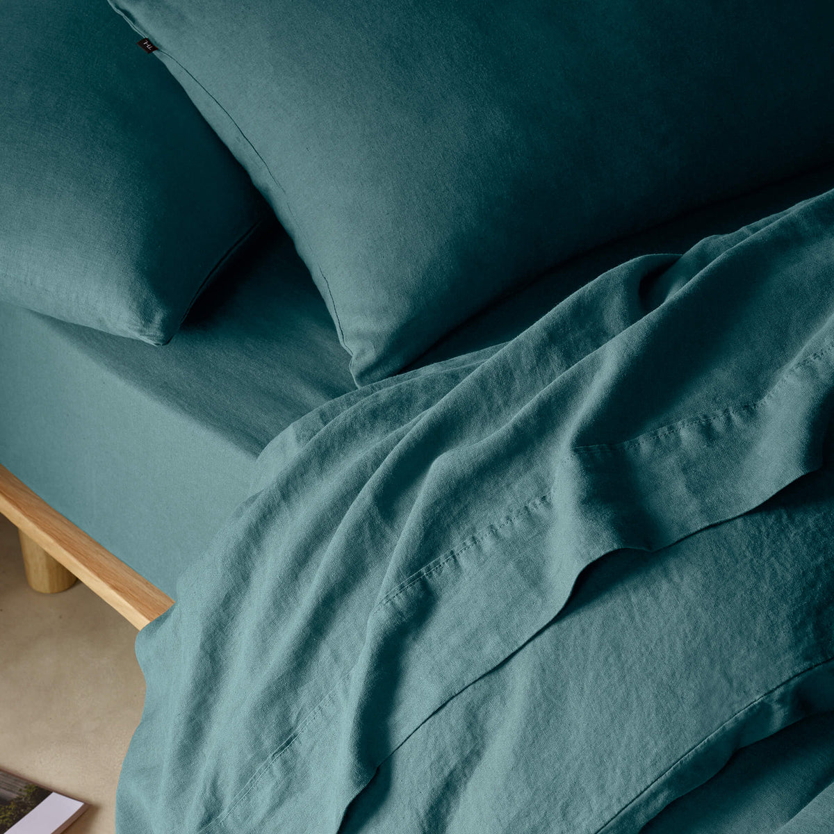 The Honest Label Pure Linen Fitted Sheet in Teal with green tones fitted sheet product view THL product image 2