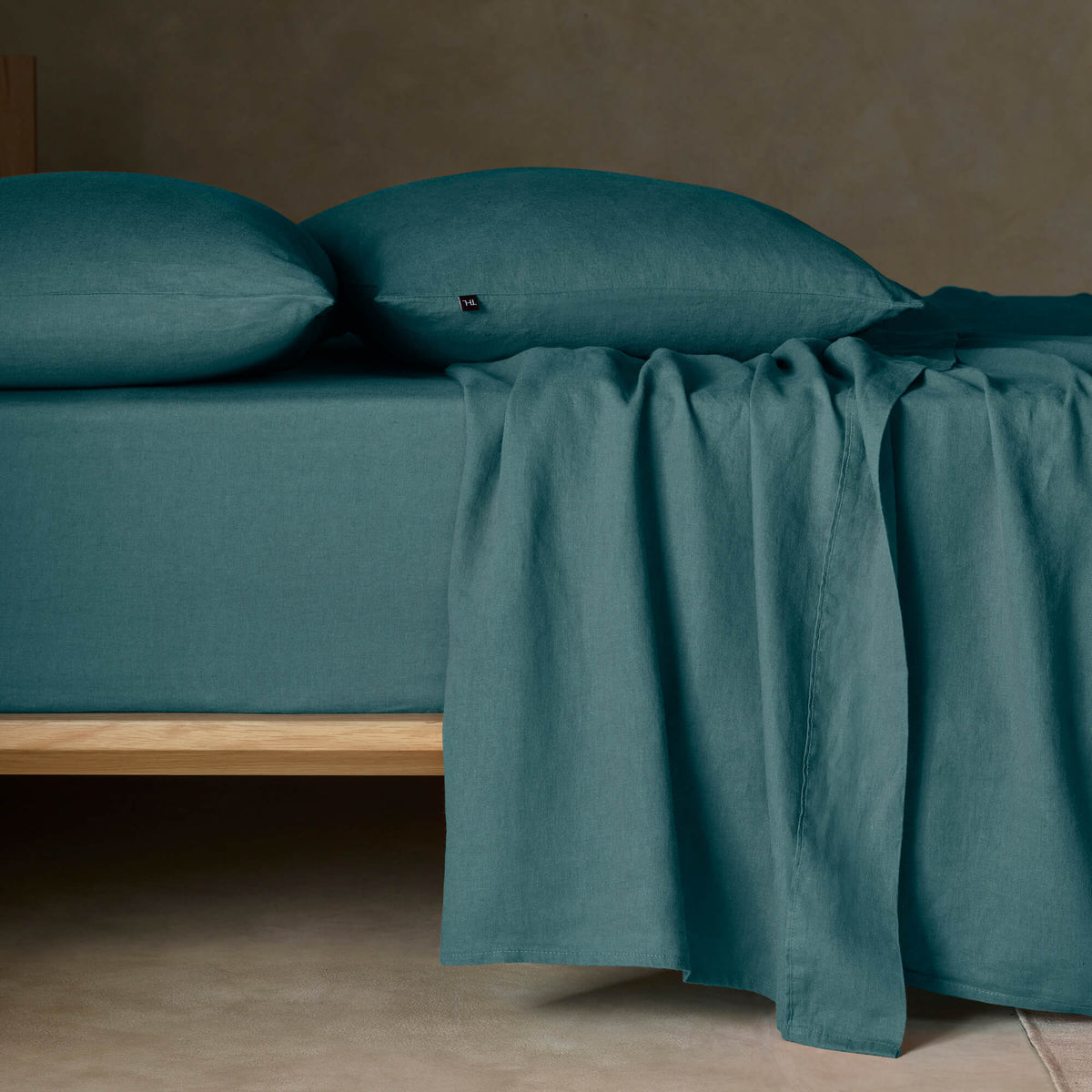 The Honest Label Pure Linen Fitted Sheet in Teal with green tones fitted sheet product view THL product image 1