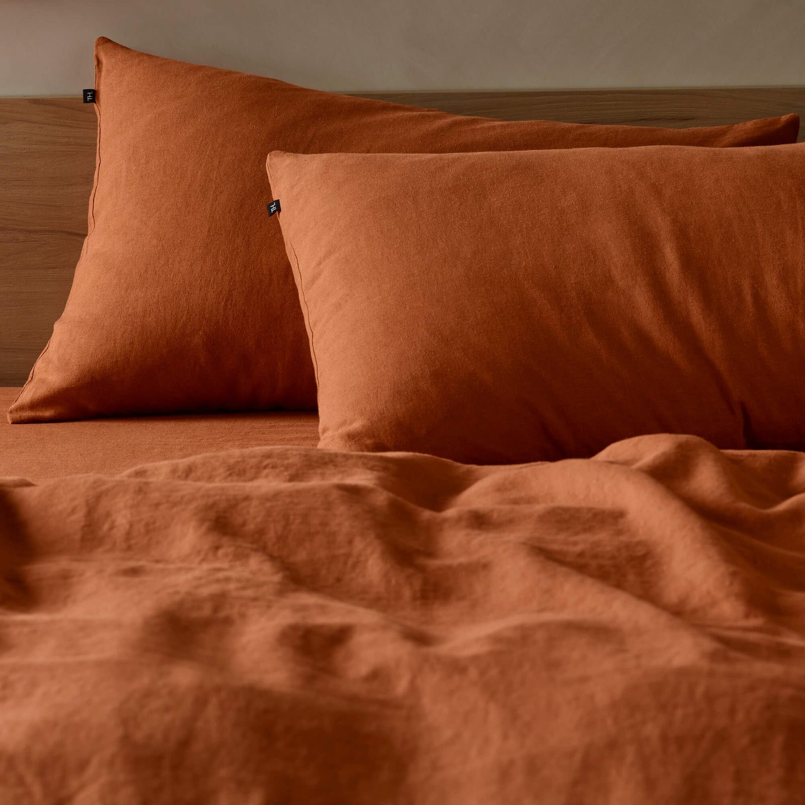 The Honest Label Pure Linen Standard Pillowcase (2 Pack) in Terracotta with red tones pillowcase product view THL product image 1