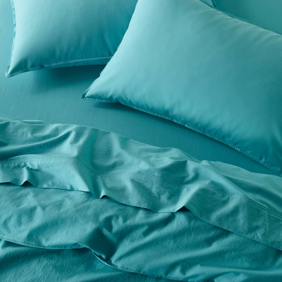 The Honest Label Washed Cotton Bedding - Azure with blue tones pillowcase product view THL product image 1