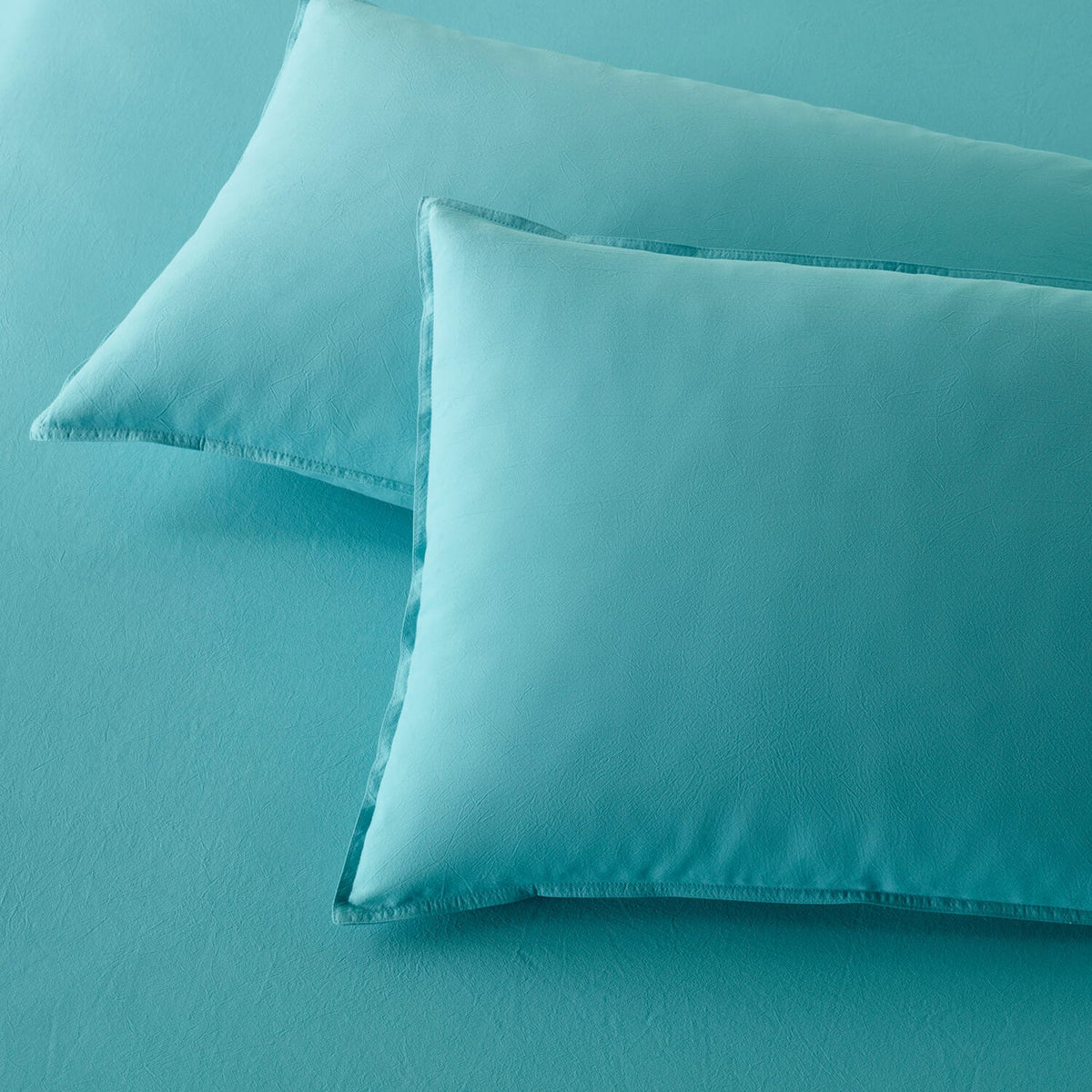The Honest Label Washed Cotton Bedding - Azure with blue tones pillowcase product view THL product image 2
