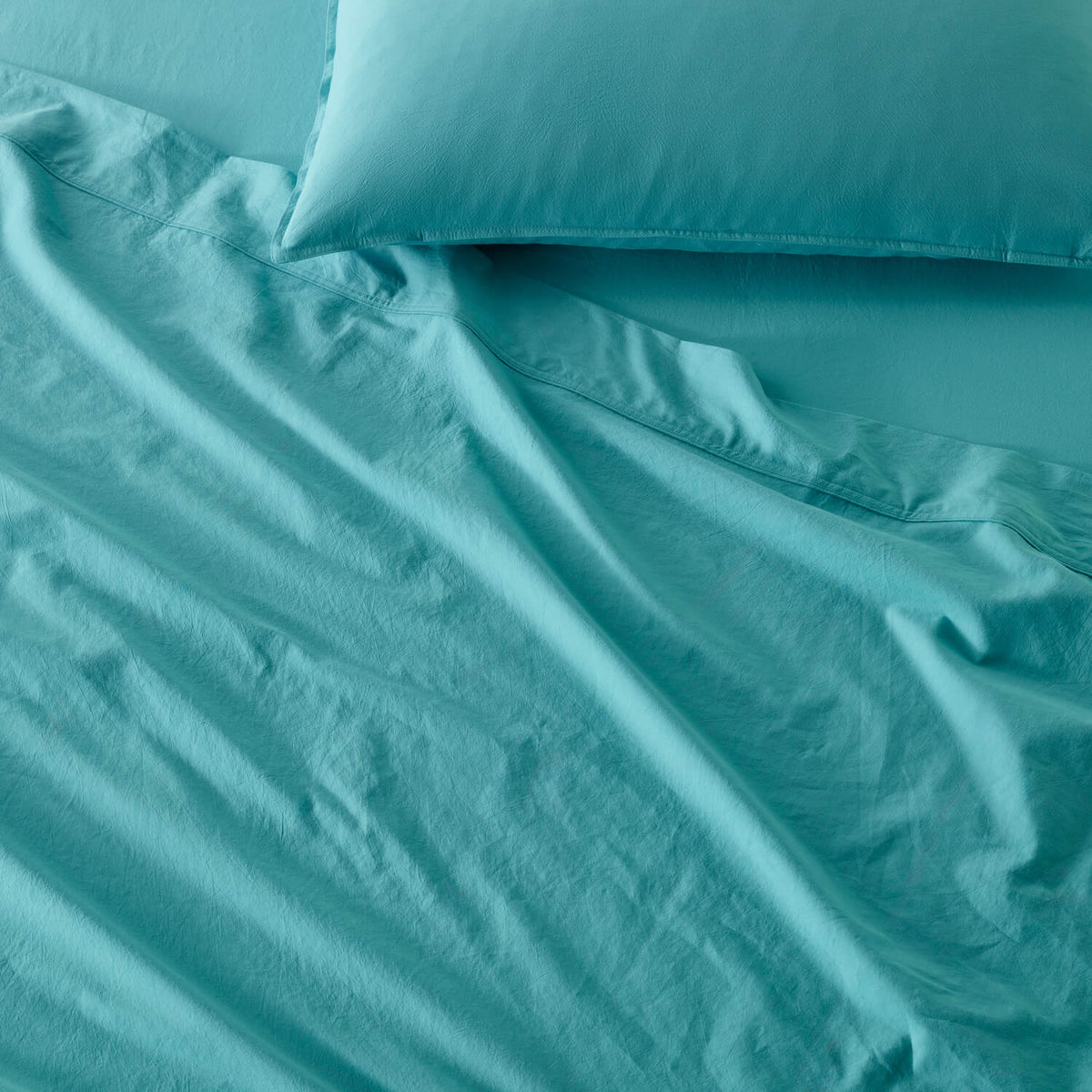The Honest Label Washed Cotton Bedding - Azure with blue tones pillowcase product view THL product image 4