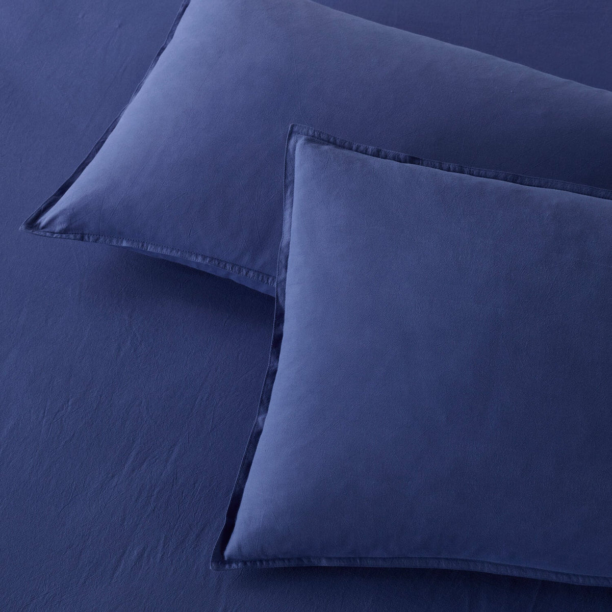 The Honest Label Washed Cotton Bedding - Cobalt with blue tones pillowcase product view THL product image 2