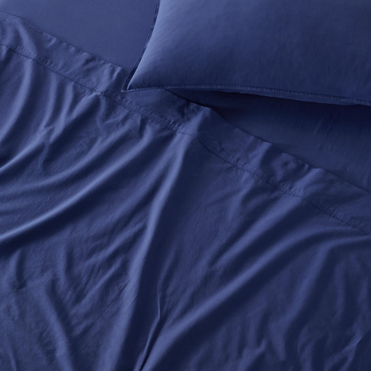 The Honest Label Washed Cotton Bedding - Cobalt with blue tones pillowcase product view THL product image 4