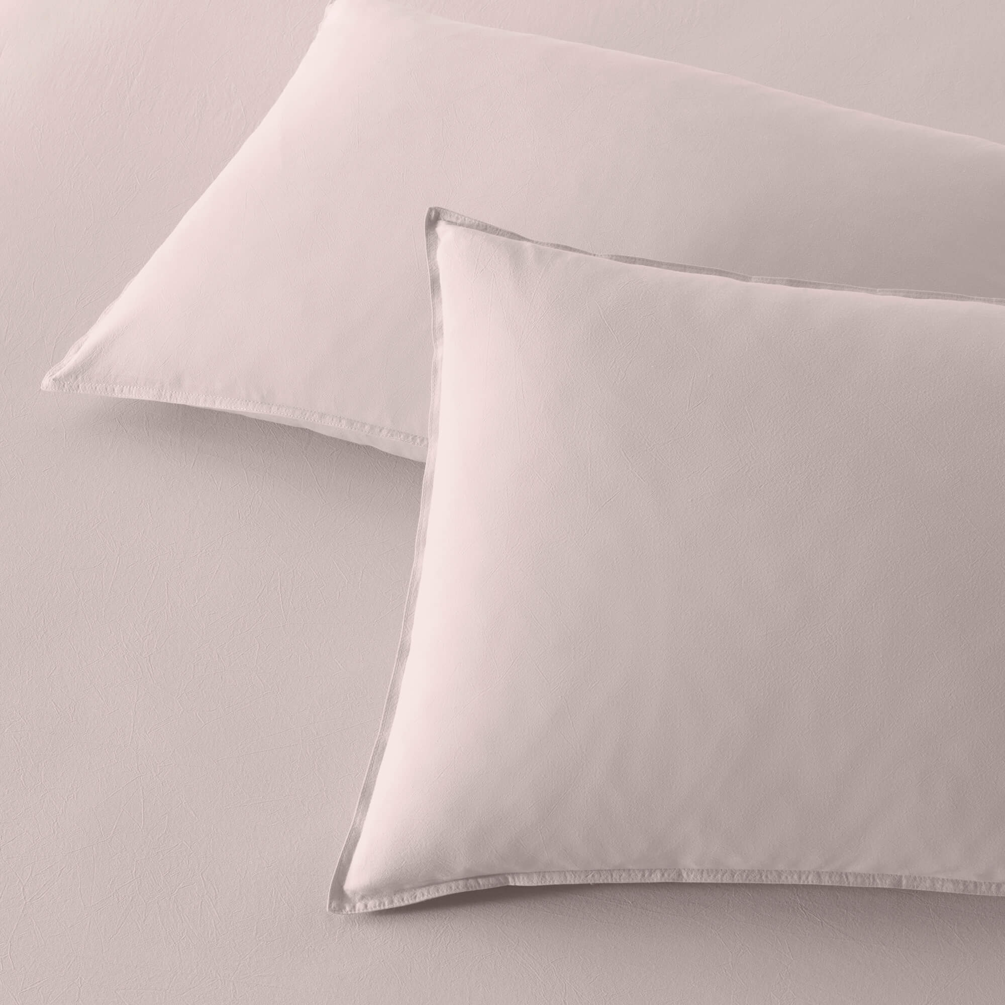 The Honest Label Washed Cotton Standard Pillowcase (2 Pack) in Blush with pink tones pillowcase product view THL product image 2