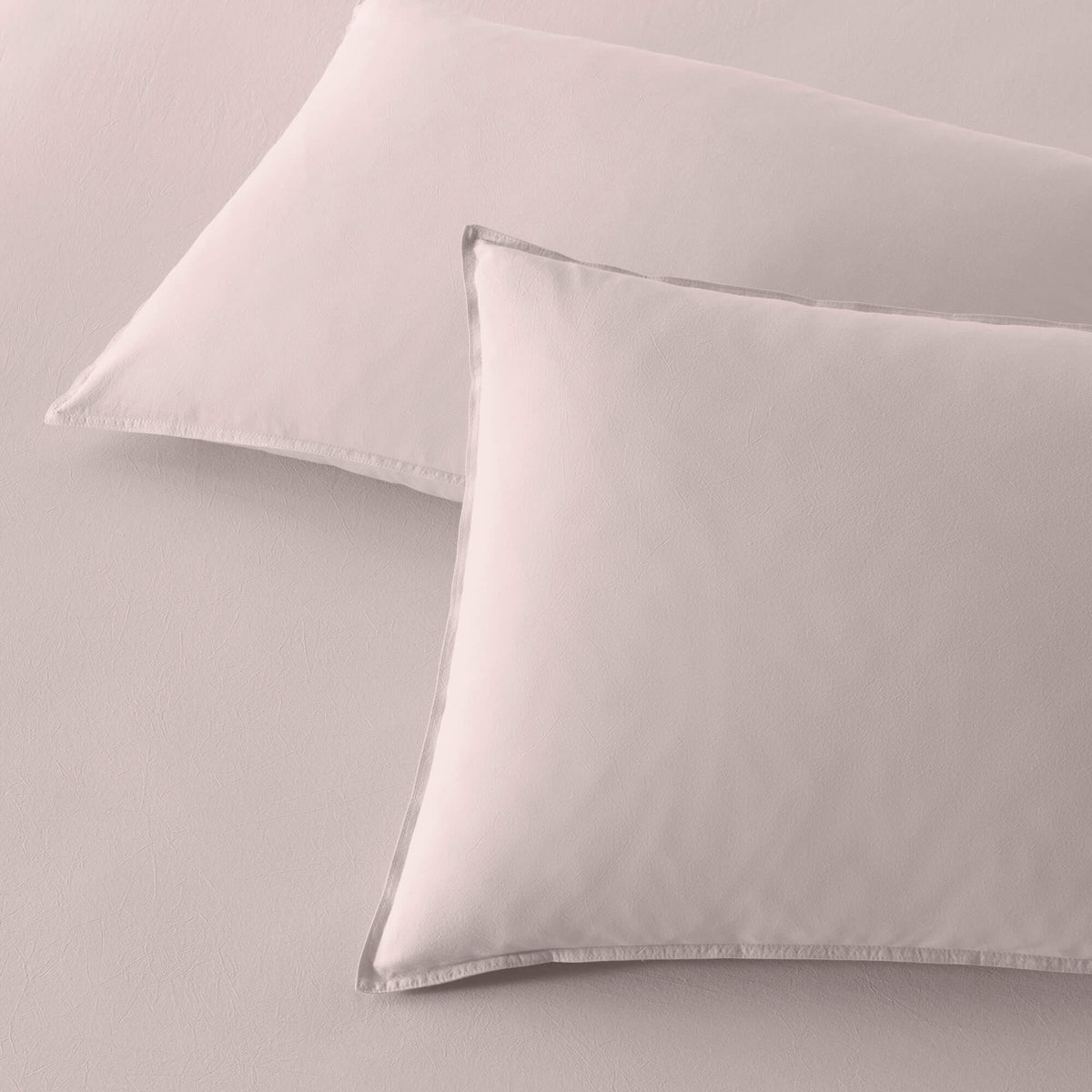 The Honest Label Washed Cotton Standard Pillowcase (2 Pack) in Blush with pink tones pillowcase product view THL product image 2