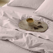 The Honest Label Washed Cotton Standard Pillowcase (2 Pack) in Blush with pink tones pillowcase product view THL product image 3