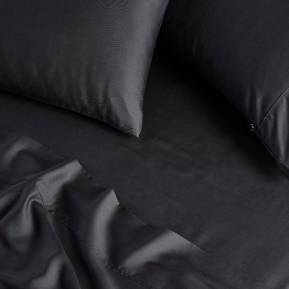 The Honest Label Graphite Cooling & Antimicrobial Sheet Set in Charcoal with grey tones sheet set product view THL product image 1